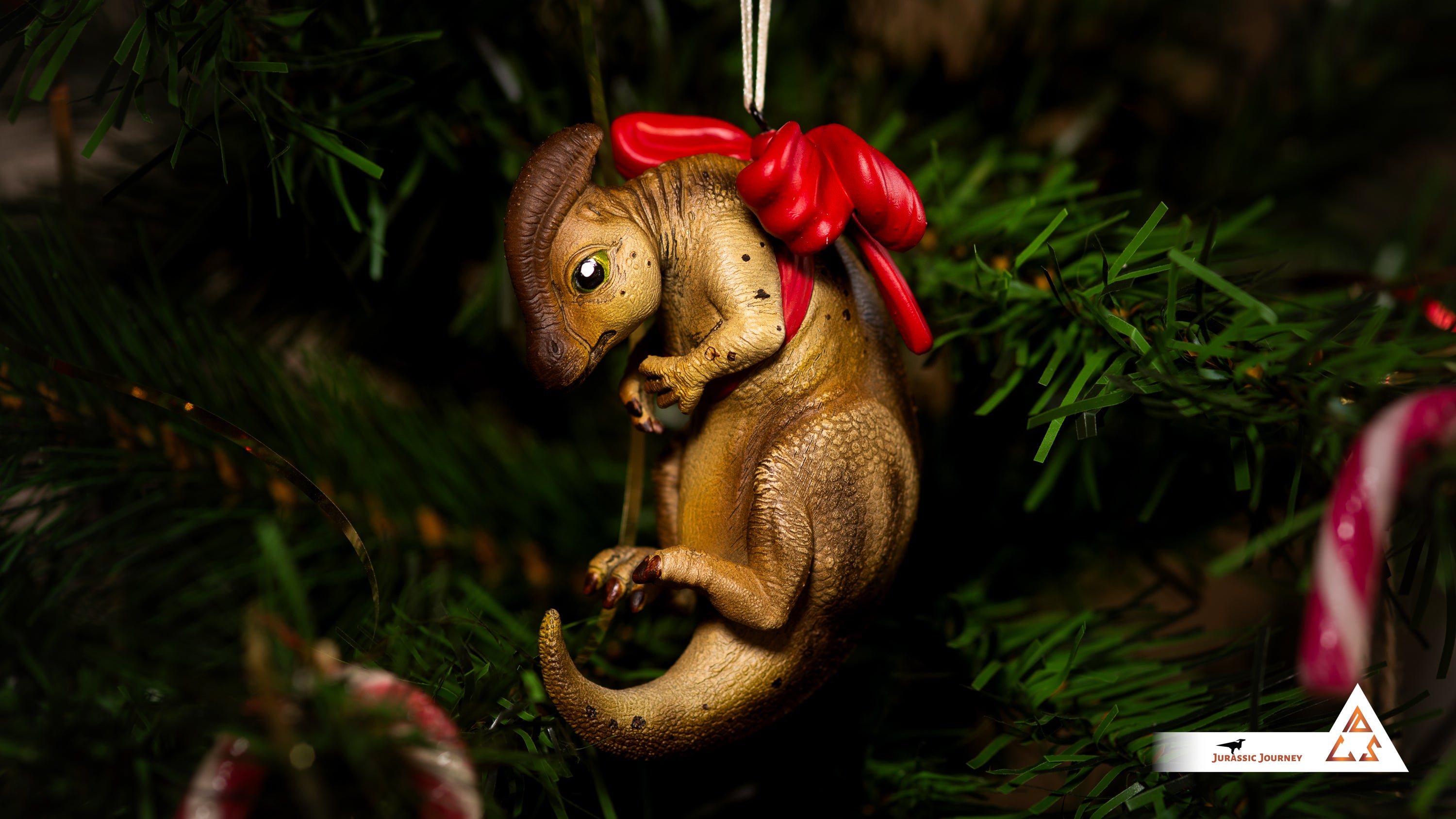Parasaurolophus Baby Ornament | Hand-painted resin collectible with ribbon – Holiday Edition