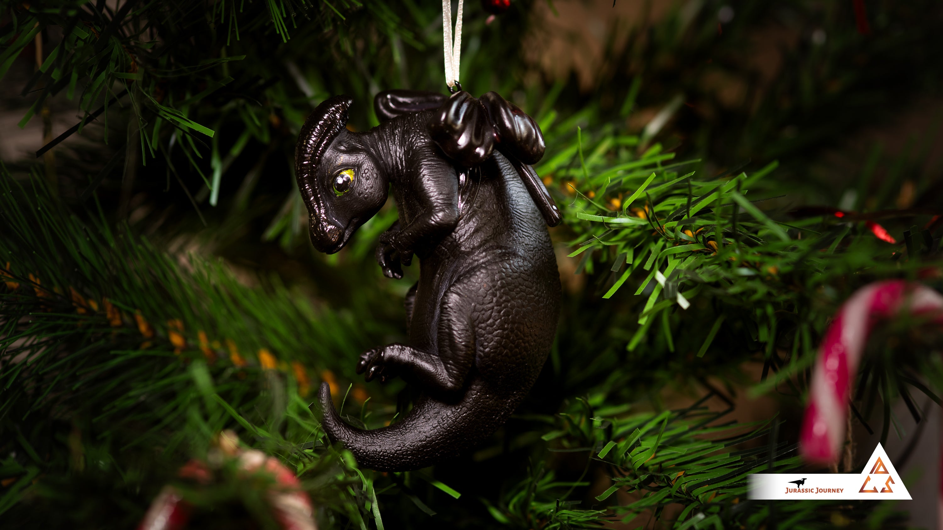 Parasaurolophus Baby Ornament | Hand-painted resin collectible with ribbon – Holiday Edition