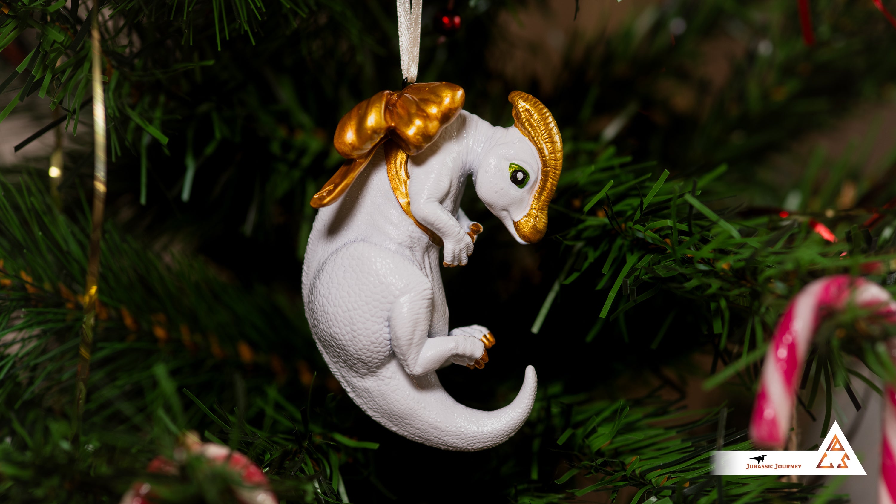 Parasaurolophus Baby Ornament | Hand-painted resin collectible with ribbon – Holiday Edition