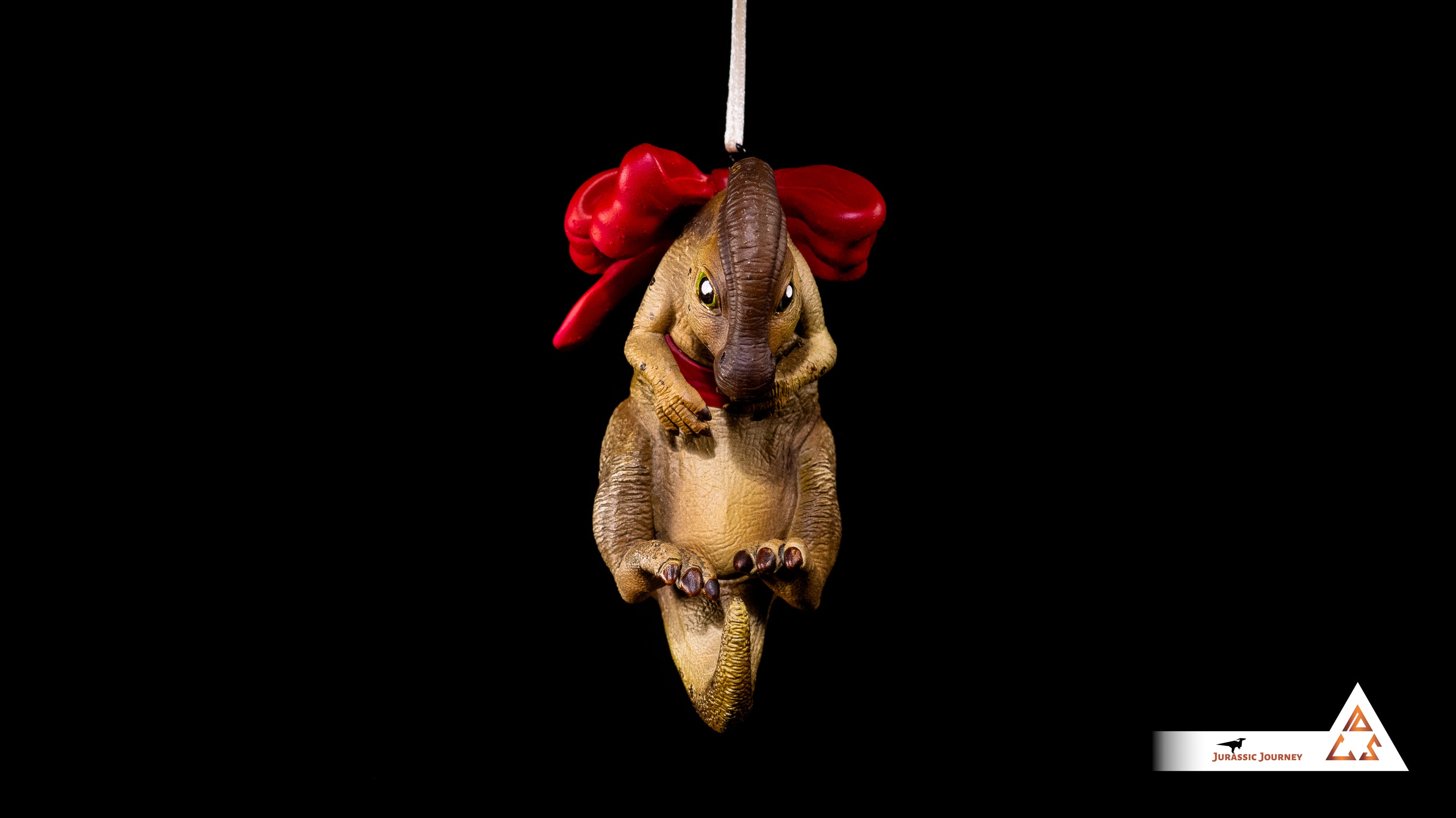 Parasaurolophus Baby Ornament | Hand-painted resin collectible with ribbon – Holiday Edition